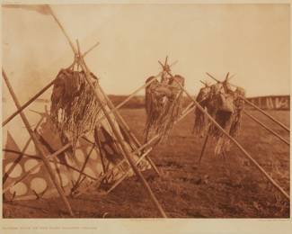 2019
Edward S. Curtis
1868-1952
"Sacred Bags Of The Horn Society - Blood," Plate 646 From "The North American Indian" Volume 18
Photogravure in brown on tissue-thin Japanese paper
From the Suffolk Engraving Co., Cambridge, MA edition printed after the 1926 original photograph copyrighted by Curtis; with the title, plate number, copyright, publisher, and artist name all printed in the blank outside the image
Image: 11.625" H x 15.5" W; Sheet: 13.375" H x 16.625" W
Estimate: $200 - $400