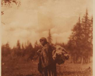 2111
Edward S. Curtis
1868-1952
"Moss For The Baby - Bags - Cree," Plate 625 From "The North American Indian" Volume 18
Photogravure in brown on tissue-thin Japanese paper
From the Suffolk Engraving Co., Cambridge, MA edition printed after the 1926 original photograph copyrighted by Curtis; with the title, plate number, copyright, publisher, and artist name all printed in the blank outside the image
Image: 15.5" H x 11.5" W; Sheet: 17.25" H x 12.5" W
Estimate: $200 - $400