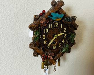 Miniature LUX wall clock. 1930's pendulant clock with animated bluebird. Estate sale price: $50