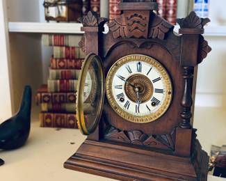 1885 Ansonia 8-Day Tivoli mantle clock. Porcelain dial in a walnut case. Estate sale price: $250