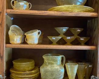 Vintage. Early mid-century hand blown yellow / golden glass: 8 x $20 (plates) = $160
8 x $10 small plates = $80
8 x $22 coffee cups = $176
7 x $25 ice cream glasses = $175
8 x $20 ice cream dishes = $160
Pitcher = $75
Sugar = $28
Large platter = $40
Medium bowl = $30

Total individually = $924
All together $500