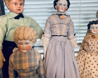 Left boy doll: Minerva doll. $35
Lower left: PET. Marion. Blonde low brow doll. $65
Middle (blue dress): Low brow doll. $75