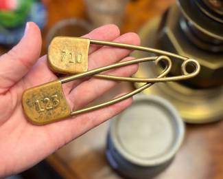 Extra large brass safety pins. Estate sale price: $25 each