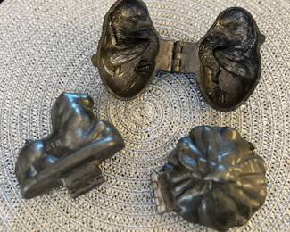 Antique pewter ice cream molds.
Left: Lion. $50
Center: Bird. $60
Right: Flower. $50