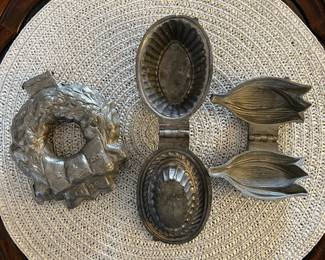 Antique pewter ice cream molds.
Left: Christmas wreath. $90
Center: Fluted basket. $25
Right: Tulip. $20
