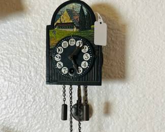 Miniature pendulum wall clock. Switzerland. Estate sale price: $50