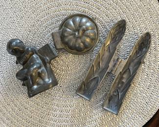 Antique pewter ice cream molds.
Left: Cupid Love. $25
Center: Asparagus. $20
Right: Pie. $30