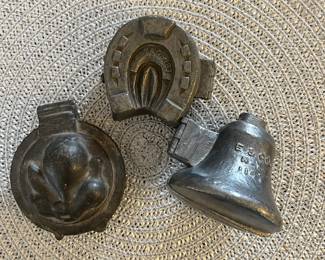 Antique pewter ice cream molds.
Left: Pear medallion. $20
Center: Good luck horse shoe. $40
Right: New York Bell. $25