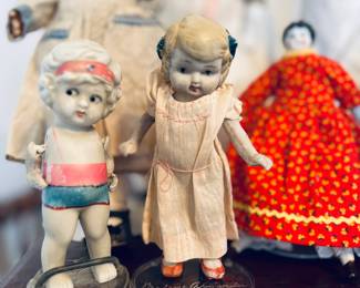 Left doll: $10
Middle doll: $10
Right doll: Hertwig China. $25