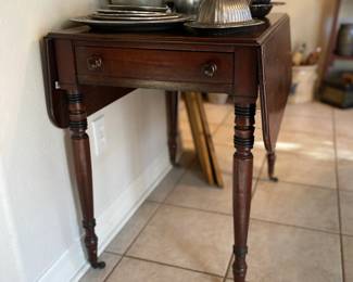 Antique mahogany drop leaf table. Estate sale price: $285