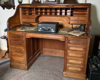 Superb 1920s Oak Roll Top "Derby" Desk. Estate sale price: $225