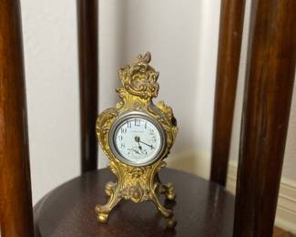 Ornate shelf clock by New Haven Clock Co. Estate sale price: $70