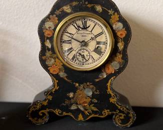 Seth Thomas Paper mache case inlaid with mother of pearl. Original paint.. Estate sale price: $375