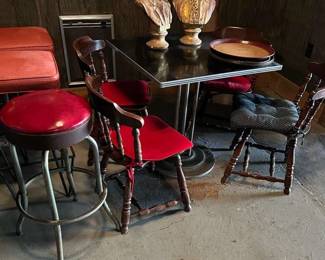 Table, 4 Chairs, 3 Stools And 2 Patrons