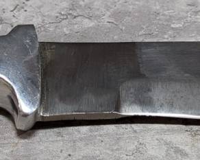 Fixed Blade Knife With Trailing Point Tip And Southwest Style Stones In Handle, 7.5" Blade