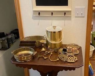 antique table, brass items