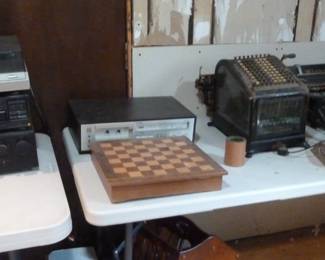 typewriter, stereo, candlestick telephone, adding machine