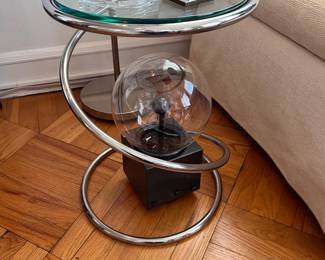 Chrome spiral glass top side table.