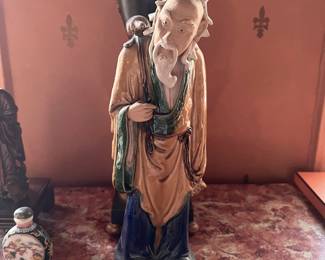Ceramic Asian figure.