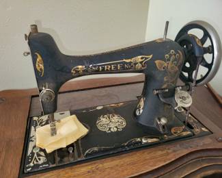 Free No. 5 sewing machine with cabinet