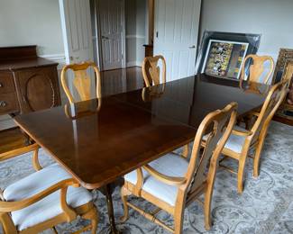 Rug and antique buffet shown are not available