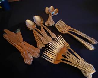 Gold flatware.