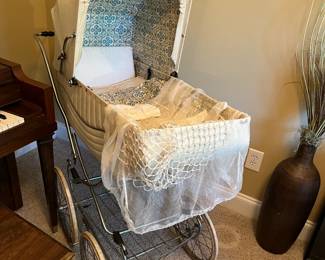#16	Antique Baby Carriage - England - w/bottom Shelf (comes off for bassinet	 $125.00 			
