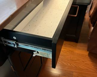 #52	black cart with as is dent copper counter 1 drawer and 2 doors on wheels 37x19x36	 $175.00 			
