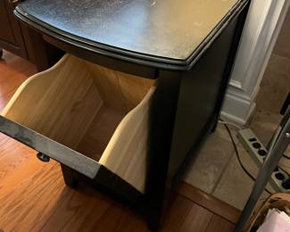 #53	black end table with hamper door flip down 16x26x25  (as is top)	 $40.00 			
