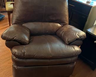 #55	Oversize Brown Pleather Rocker Recliner	 $100.00 			
