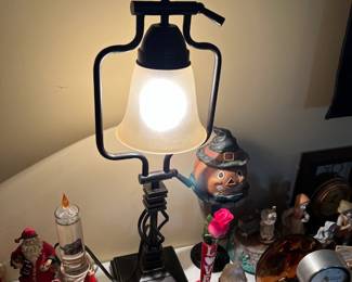 #62	Heavy Metal Lamp that pivots out (double pivot) - 26" Tall	 $75.00 			
