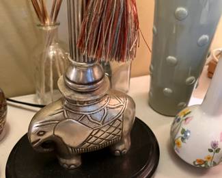 #63	Heavy Metal Base Lamp w/Siulverplate elephant on Base - 35" Tall	 $75.00 			
