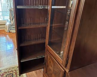 #68	5 pc. Entr. Center w/Sides that have 3 Top beveled Glass Doors & lighted Center, has 2 pull-out sides for DVDs on Bottom has 1 door & 2 slide-out Center - Must Take All and Move it Out - 105" Across x 23"D x 79"T  (each end 32"W)	 $125.00 			
