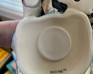 #105	Mudpie Nurse Pig Bank - in Box	 $30.00 			
