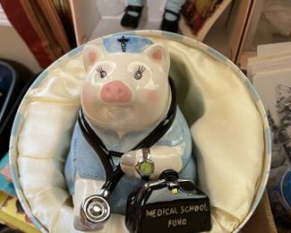 #105	Mudpie Nurse Pig Bank - in Box	 $30.00 			
