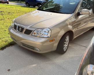 #161	2005 Suzuki Forenza - Garage Kept - Mileage 51,750 - Taking Offers Till Friday -at noon  4 door, AC Working, Cloth Interior, wagon 				
