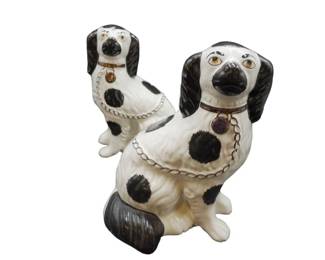 PAIR BLACK AND WHITE STAFFORDSHIRE CERAMIC DOGS