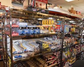 Display corner with model cars from brands like M2 Machine, Johny Lightning, Jada,..