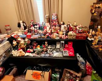 Christmas lights, tree toppers, outside decorations... you name it...it's here! Santa's big & small. 