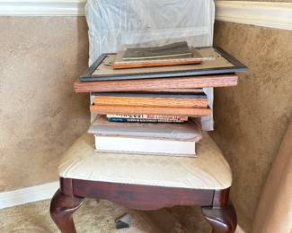 Dining room chair, books, frames