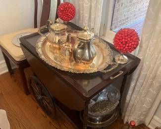 Again all Sterling on top of antique tea cart
