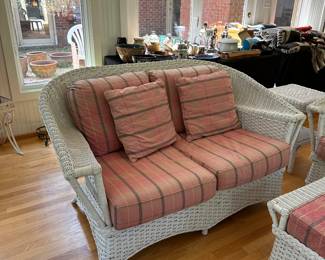 RF1 - $350 Each. Henry Link Wicker Loveseat. (2 available) Very Good vintage condition. Measures 59" at the widest point x 34" Floor to top of Back x 35" deep. (Cushions are sun faded from all of the windows and skylights)