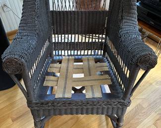 RF4 - $95. Black Wicker Chair (Antique?) Measures 29" wide outside arms. 