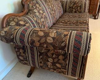 RA9 - $175. Wood carved couch with duck heads. Measures 29" deep x  76" long  x 34 tall. 