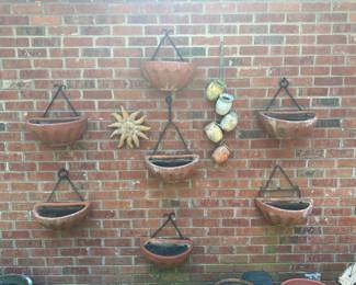 RP10 - $30 EACH. Vintage Terra Cotta Wall Pockets 7 matching - comes with hand forged wall hangers. 