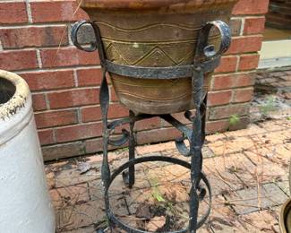 RP47 - $45. Terra Cotta Planter in Stand. Measures 24" tall. 