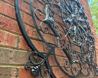 RP48 - $225. Large Metal Outdoor Wall Art. Measures 50" round. 