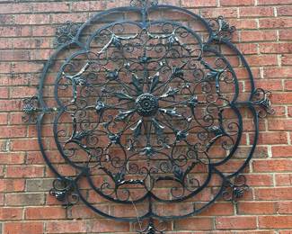 RP48 - $225. Large Metal Outdoor Wall Art. Measures 50" round. 