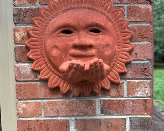 RP58 - $35. 15" round sun with hands. Terra Cotta. 