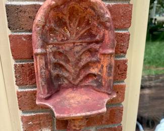 RP63 - $25. Terra Cotta Wall Shelf. Has crack on left side. 8" wide x 13" tall. 